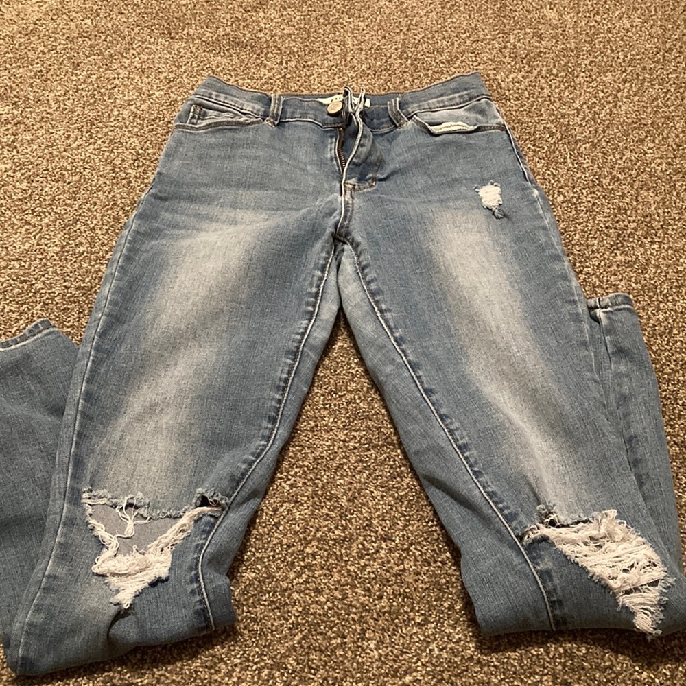 Women's Distressed Blue Jeans